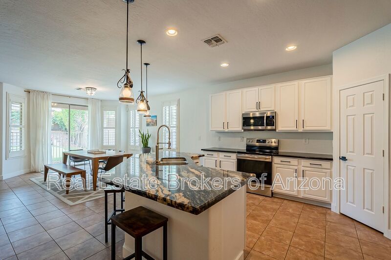 Phoenix Pool Home | 4 Bedrooms, Solar + Backyard Putting Green property image