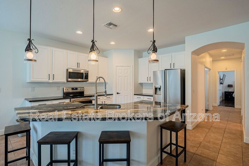 Phoenix Pool Home | 4 Bedrooms, Solar + Backyard Putting Green property image