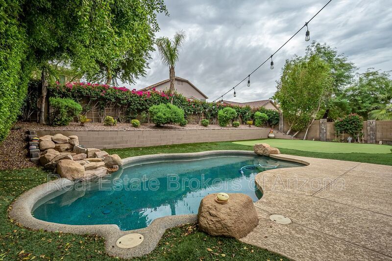 Phoenix Pool Home | 4 Bedrooms, Solar + Backyard Putting Green property image