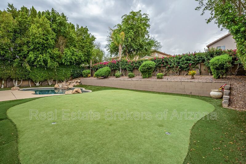 Phoenix Pool Home | 4 Bedrooms, Solar + Backyard Putting Green property image