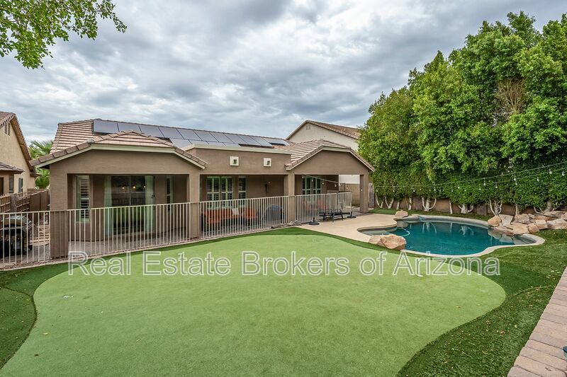 Phoenix Pool Home | 4 Bedrooms, Solar + Backyard Putting Green property image