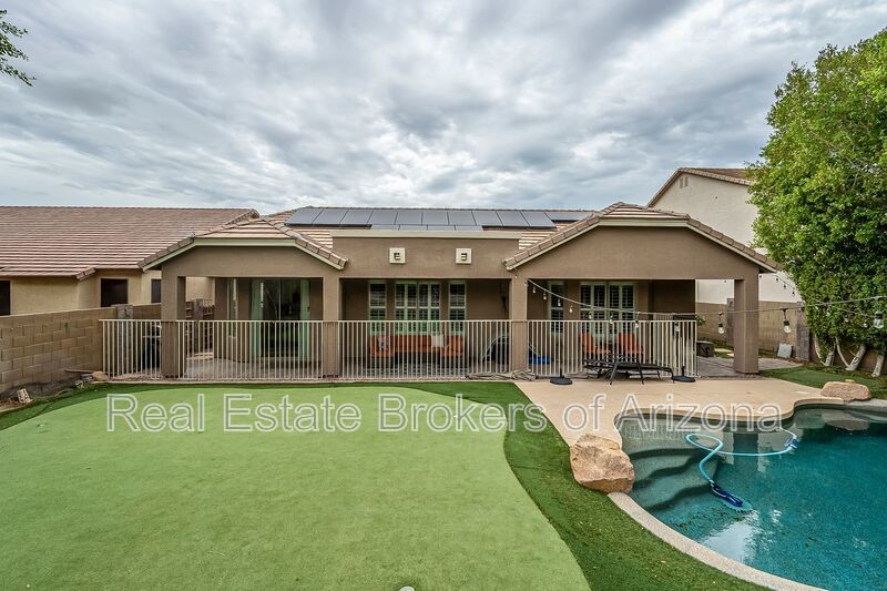 Phoenix Pool Home | 4 Bedrooms, Solar + Backyard Putting Green property image