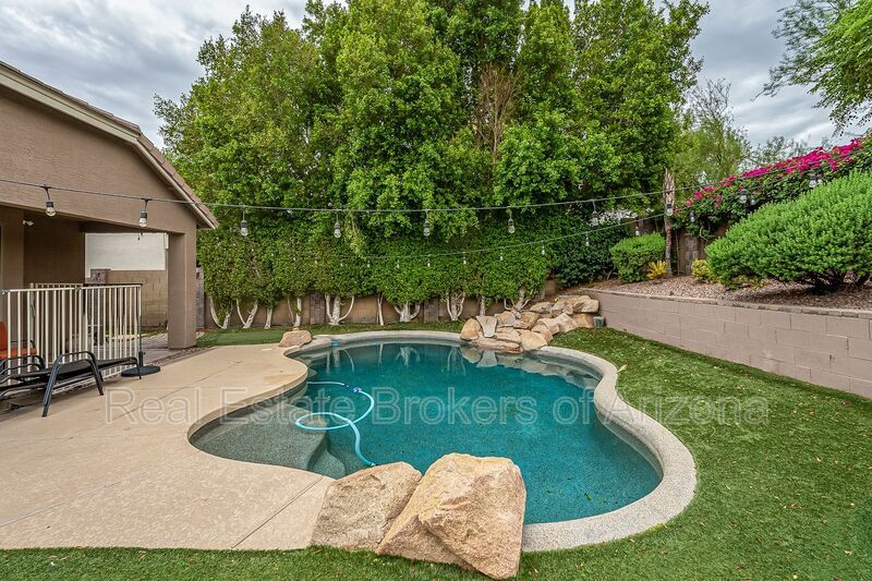 Phoenix Pool Home | 4 Bedrooms, Solar + Backyard Putting Green property image