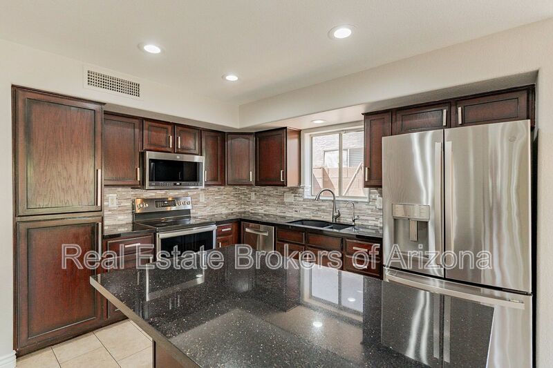 Elegant Living: Custom Upgrades and Superior Comfort in Phoenix property image