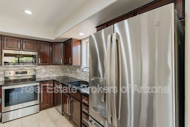Elegant Living: Custom Upgrades and Superior Comfort in Phoenix property image