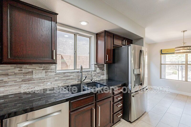 Elegant Living: Custom Upgrades and Superior Comfort in Phoenix property image