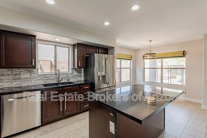Elegant Living: Custom Upgrades and Superior Comfort in Phoenix property image